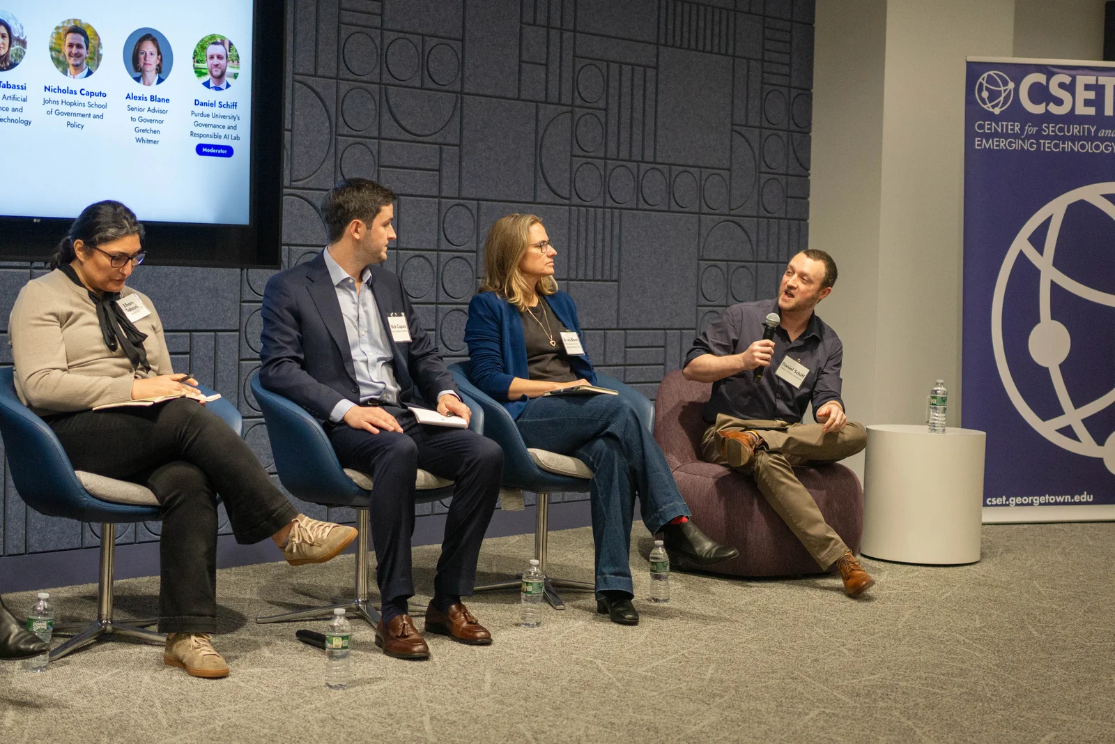 Daniel Schiff moderating a panel at the AI safety and governance workshop in Washington, DC