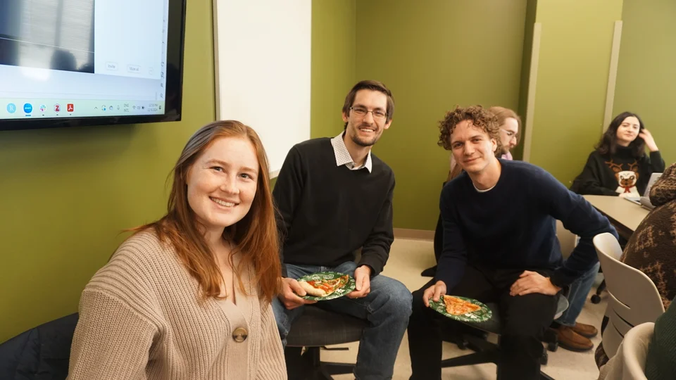 Three GRAIL colleagues together at a lab meeting