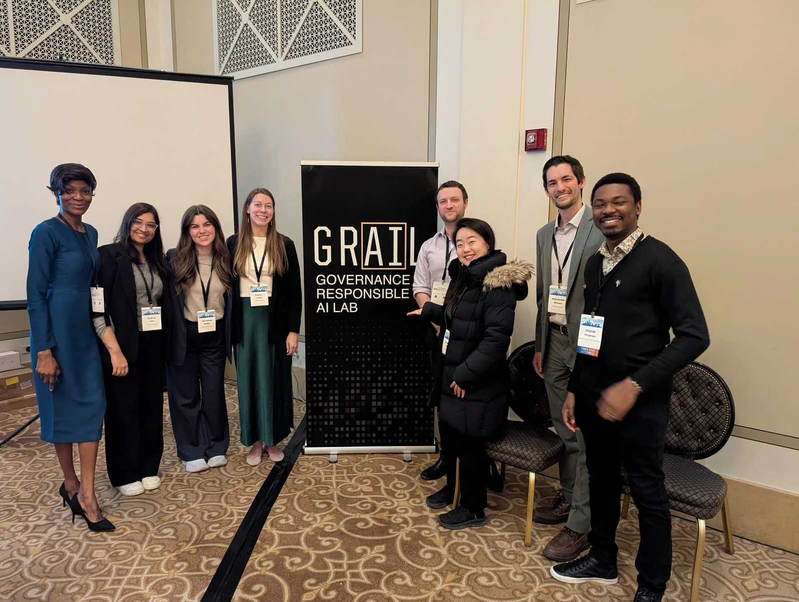 Group beside the GRAIL banner at MPSA