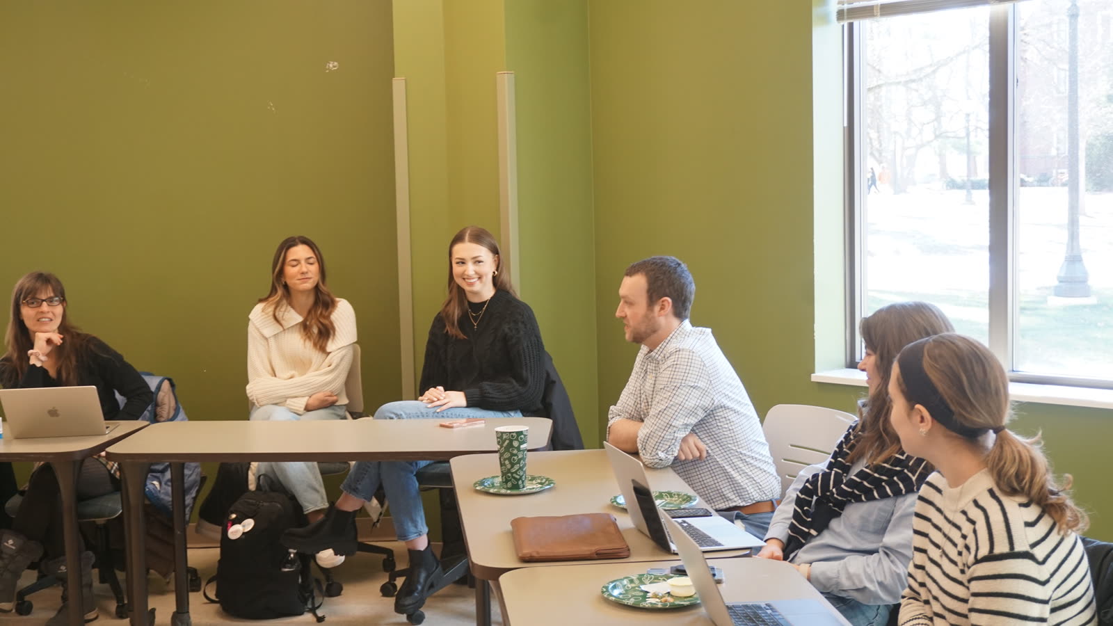 GRAIL members in discussion at a lab meeting