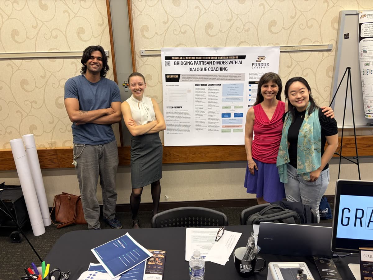 GRAIL researchers with their poster at the Purdue AI Showcase